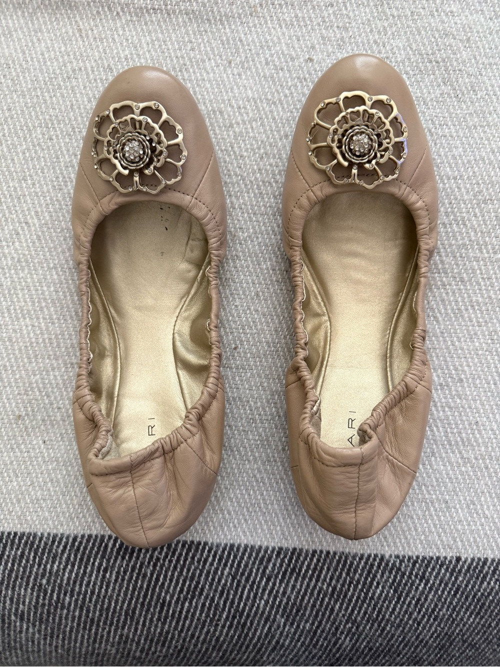 Tahari Beige Leather Ballet Flats with Gold Floral Emblem